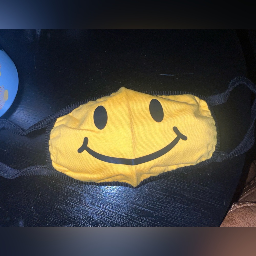 15- Tipsy Elves Yellow Smiley Face Mask